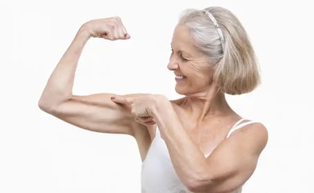 senior-woman-flexing-muscles.v638527089893115819 (1)